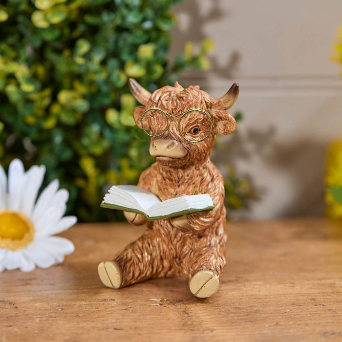 Resin Highland Cow Reading a Book